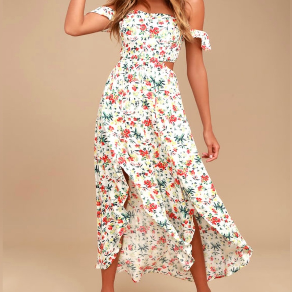 Maxi dress with die cutouts, off the shoulder option and smocked styled back.